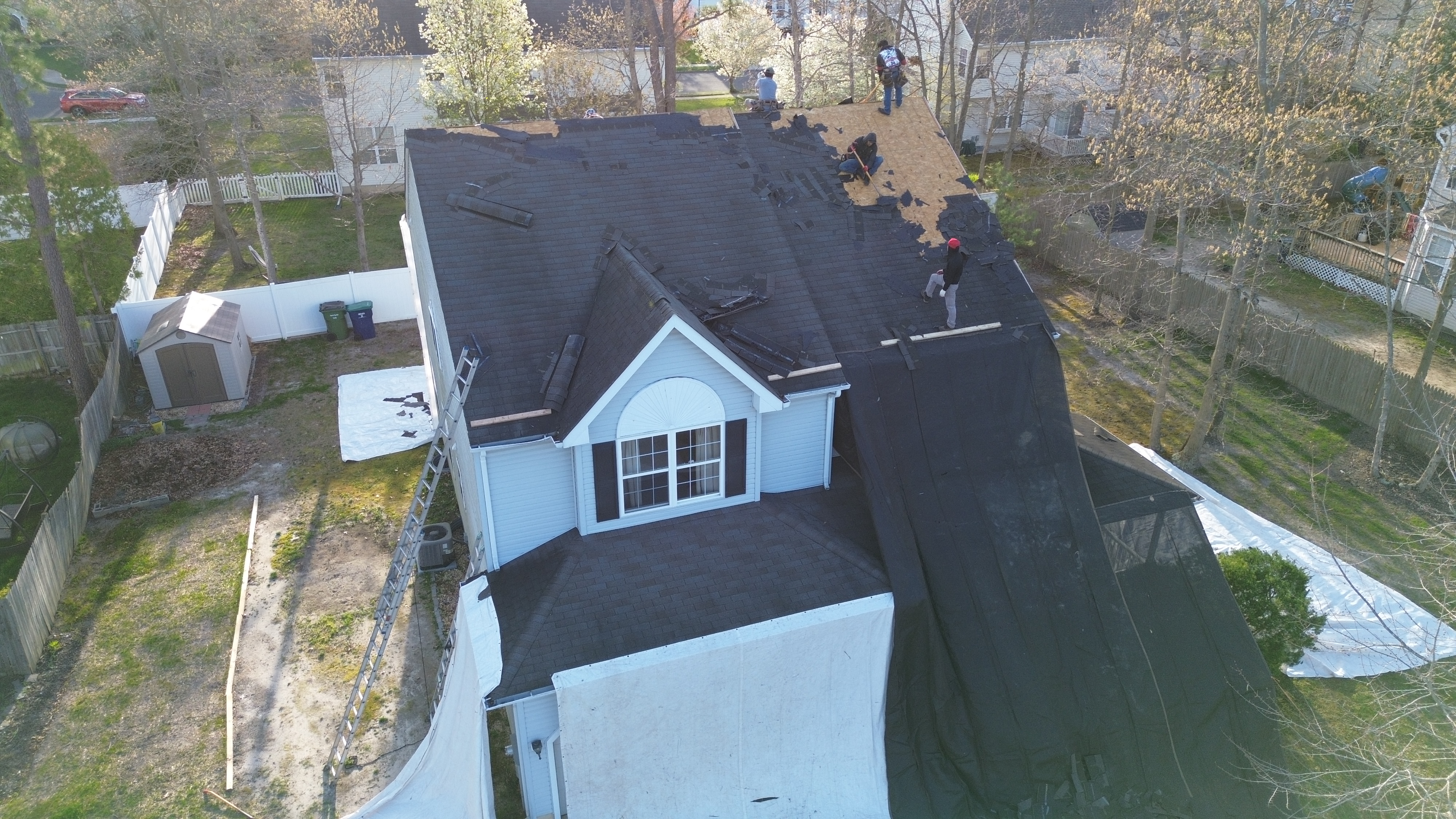 Twin Shield Roofing crew installing shingles on a South Jersey home