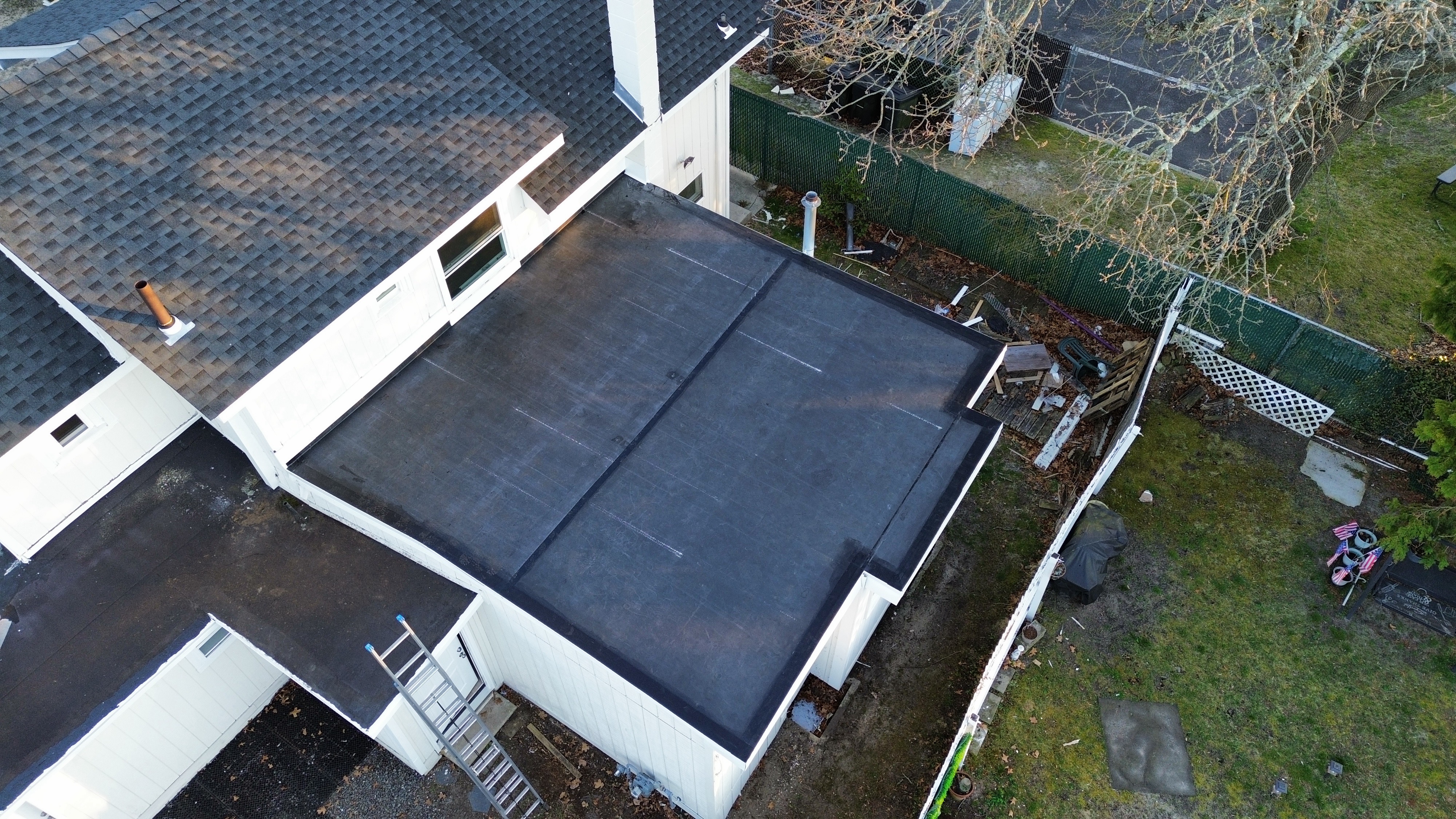 Completed flat roof installation on a residential property