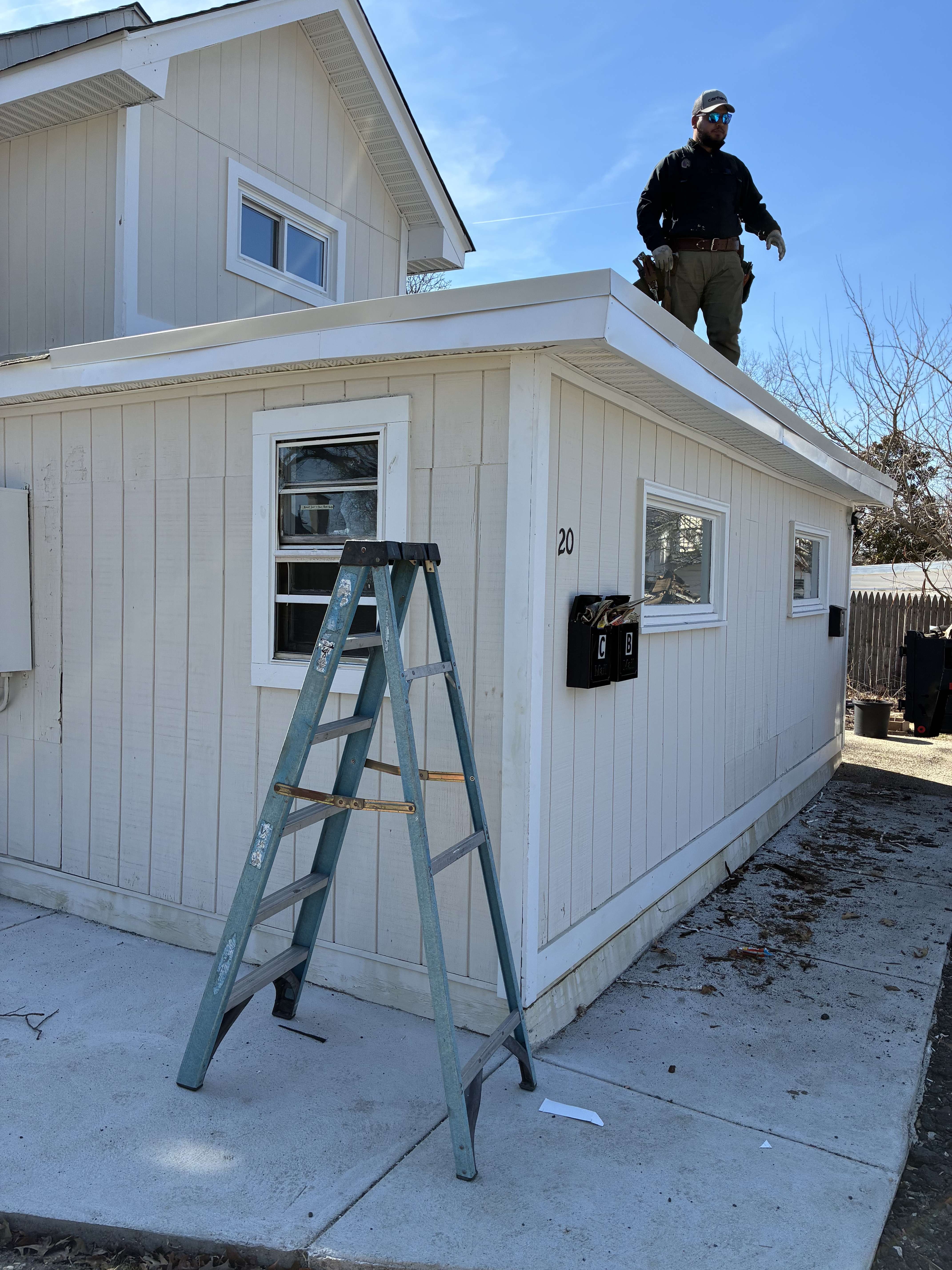 Twin Shield Roofing crew working on a residential roof in South Jersey
