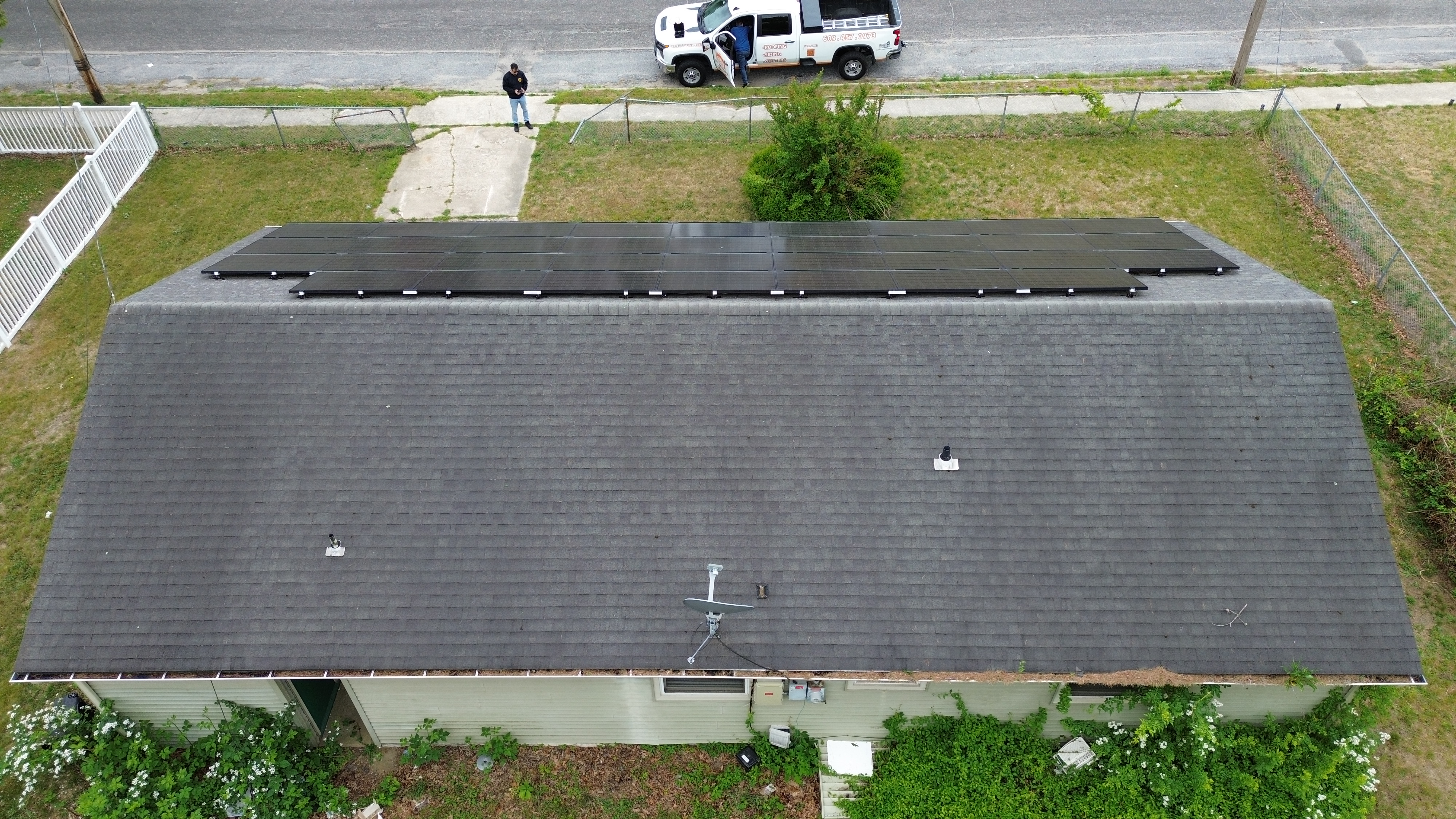 Twin Shield Roofing contractor performing a free roof inspection on a residential home in South Jersey